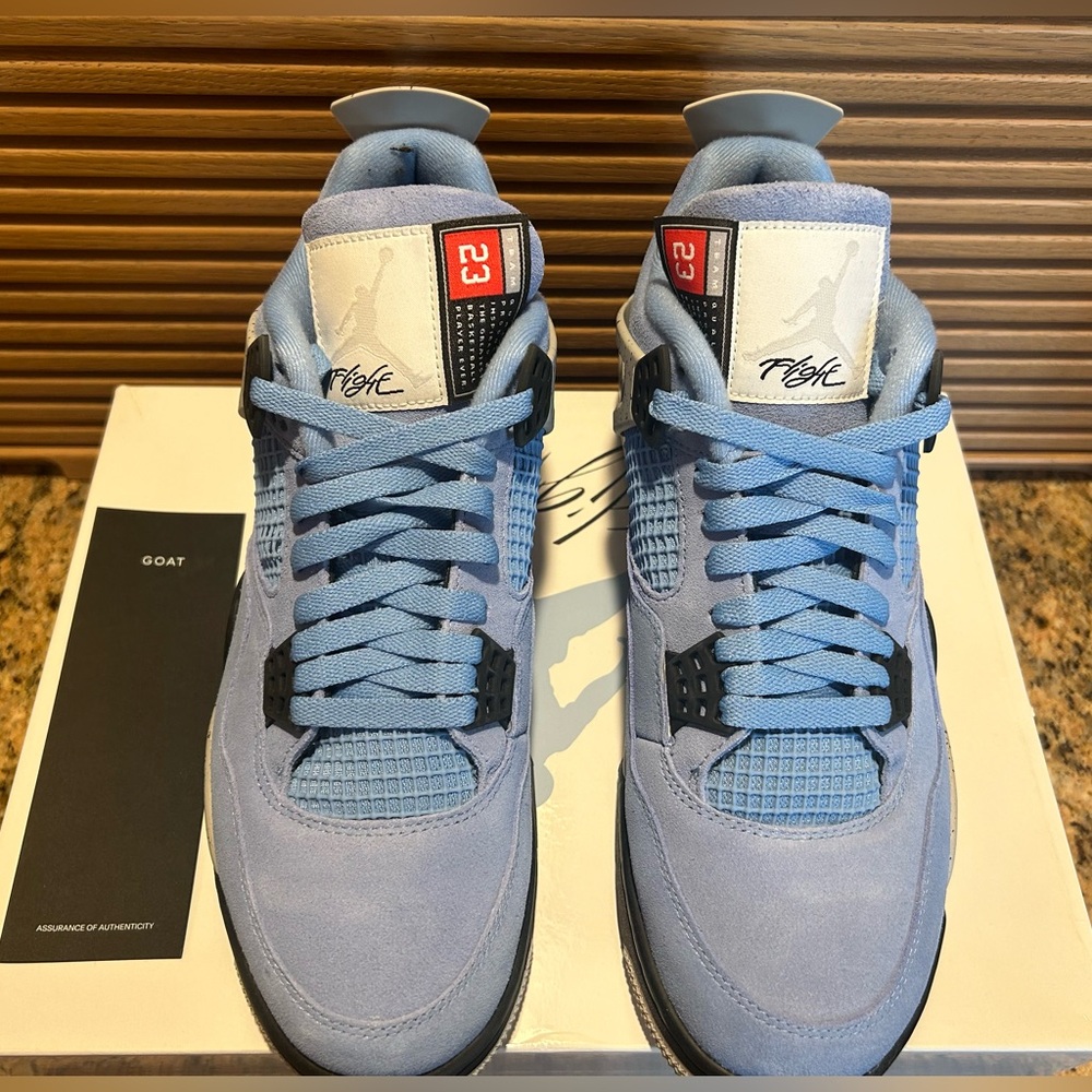 Jordan 4 Retro University Blue. Worn Once. Excellent Condition.